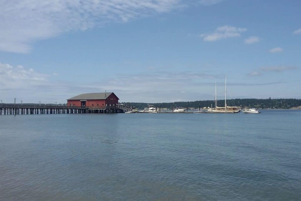 Historic Coupeville Wharf on Whidbey Island Historic Coupeville Wharf on Whidbey Island with boats in Penn Cove
