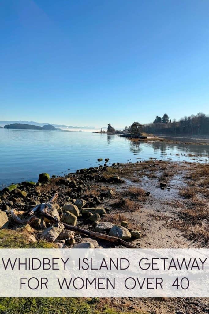 Whidbey Island getaway for women over 40 Rocky shoreline and calm water view on a Whidbey Island getaway for women over 40