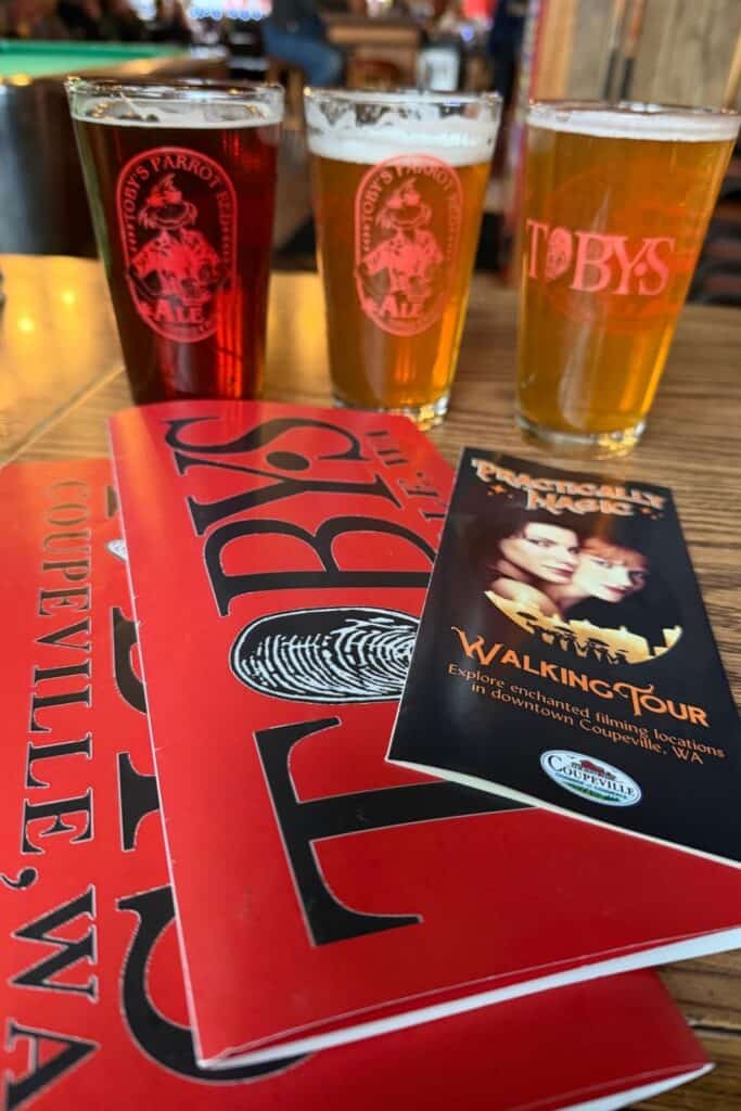 Practical Magic walking tour at Toby’s Tavern in Coupeville Pints of beer, dinner menus, and a Practical Magic walking tour brochure at Toby’s Tavern in Coupeville