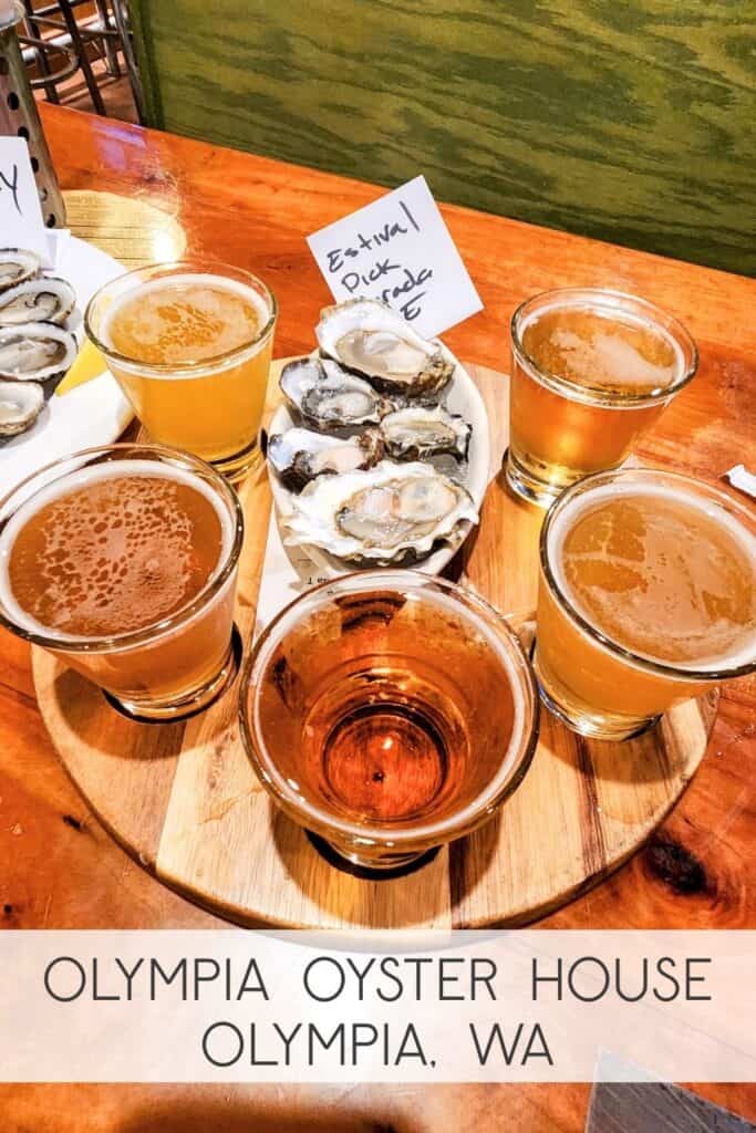 A beer flight and fresh oysters in a half shell at the Olympia Oyster House in Olympia, Washington