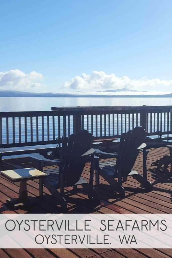 Adirondack chairs on an open-air deck facing the Willapa Bay at Oysterville Sea Farms in Oysterville, Washington