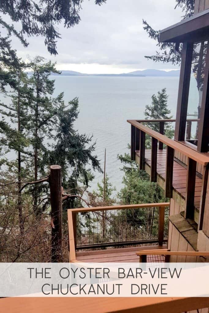 Patio and stairs looking out at the water of Samish Bay at The Oyster Bar on Chuckanut Drive in Western Washington