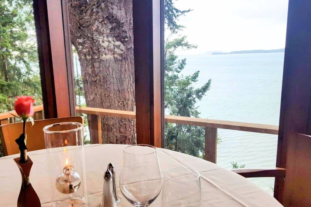 Romantic waterfront views from a table inside The Oyster Bar on Chuckanut Drive in Bow, Washington