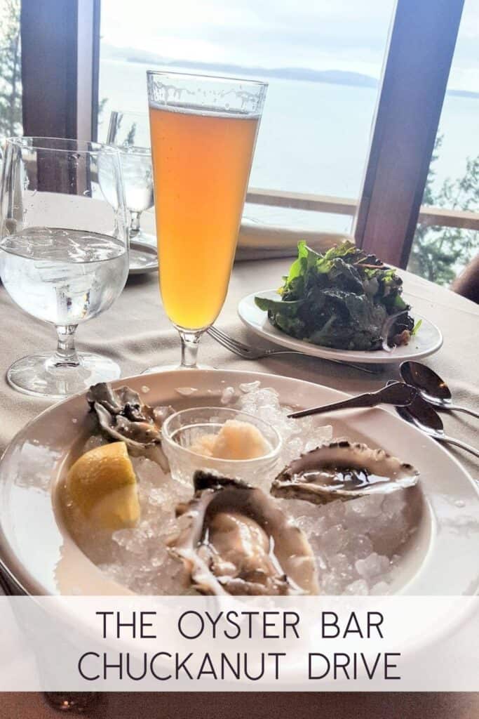A chilled plate of fresh oysters in a half shell and a glass of beer with water views at The Oyster Bar on Chuckanut Drive in Washington