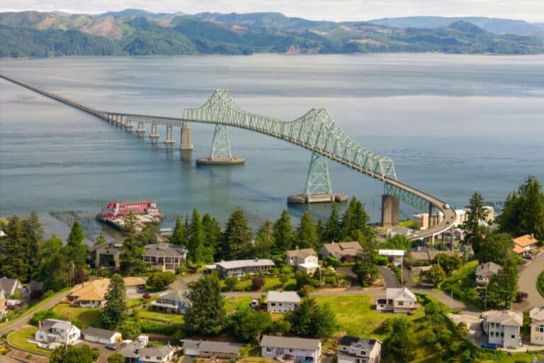 Astoria Oregon coastal town with a view of the Astoria-Megler Bridge crossing the Columbia River.