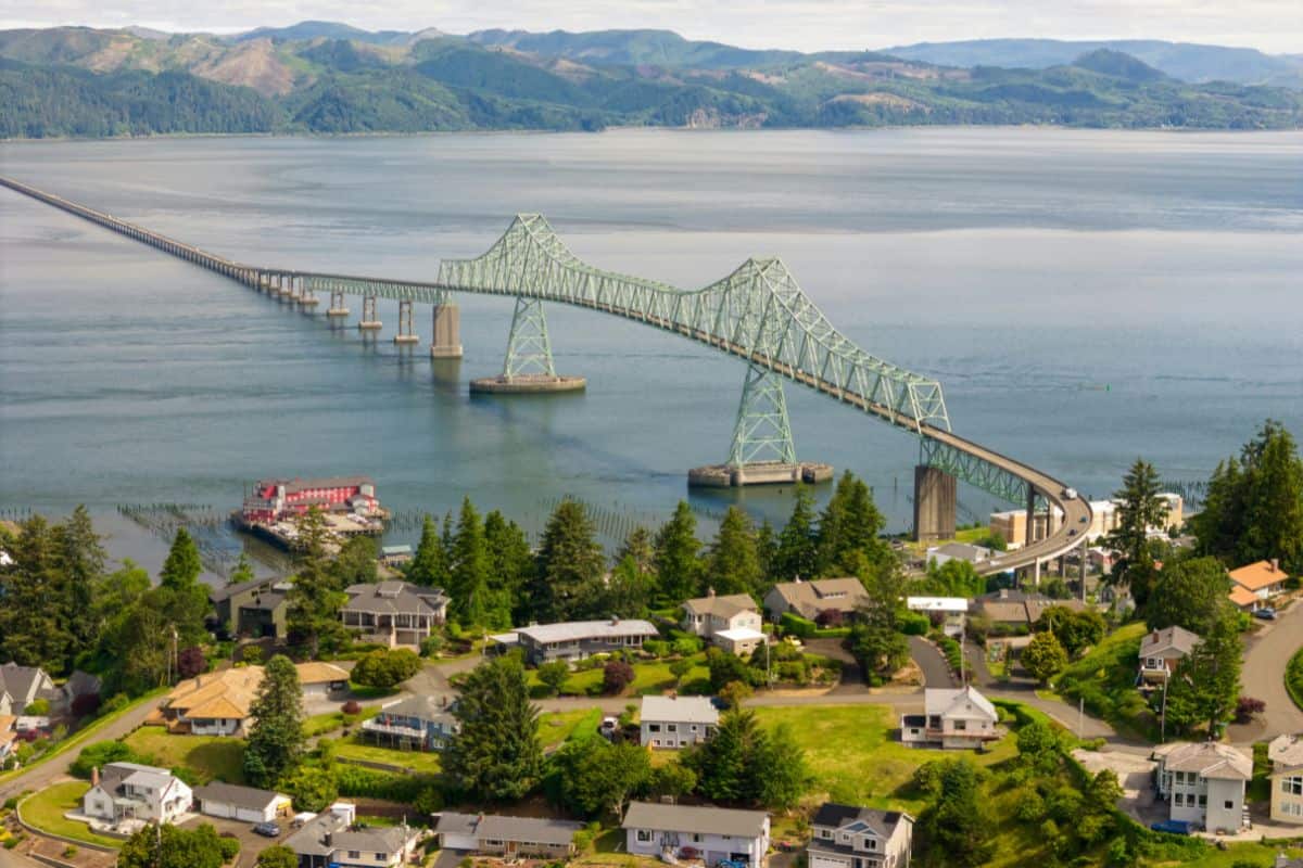 Astoria Oregon coastal town with a view of the Astoria-Megler Bridge crossing the Columbia River.