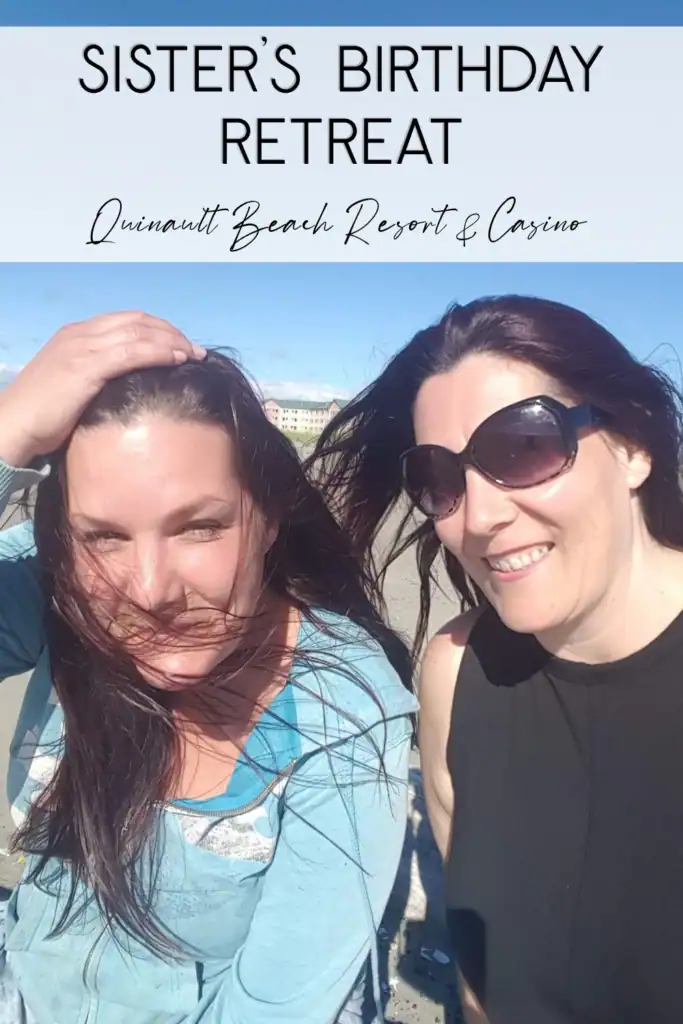 quinault-beach-resort-casino-ocean-shores-sister-birthday-trip Two smiling sisters taking a sunny, windswept selfie on the sandy beach outside of the Quinault Beach Resort and Casino in Ocean Shores WA.