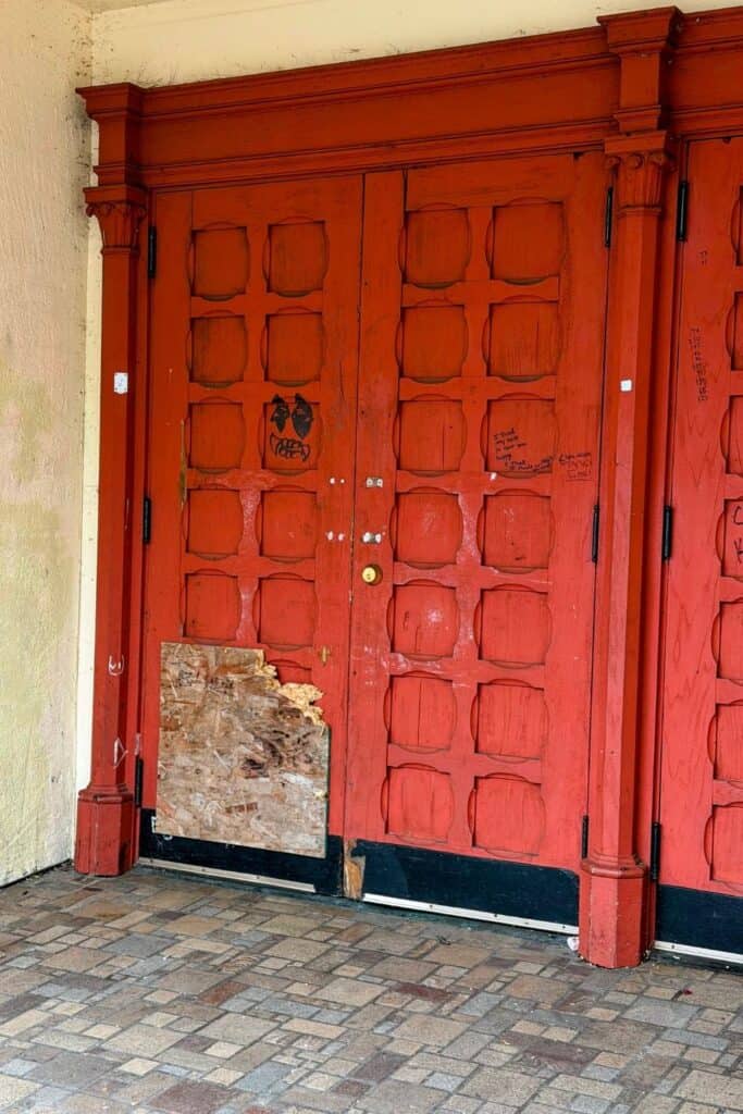 Weathered historic doors in Aberdeen Washington Weathered red wooden doors on an aging historic building in Aberdeen, Washington.