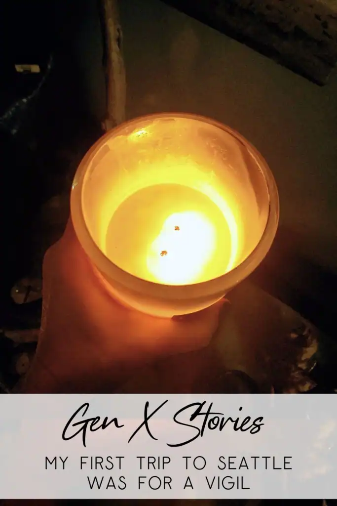 Glowing Candle for Memory and Reflection A glowing candle representing memory, grief, and reflection in a personal Pacific Northwest travel story