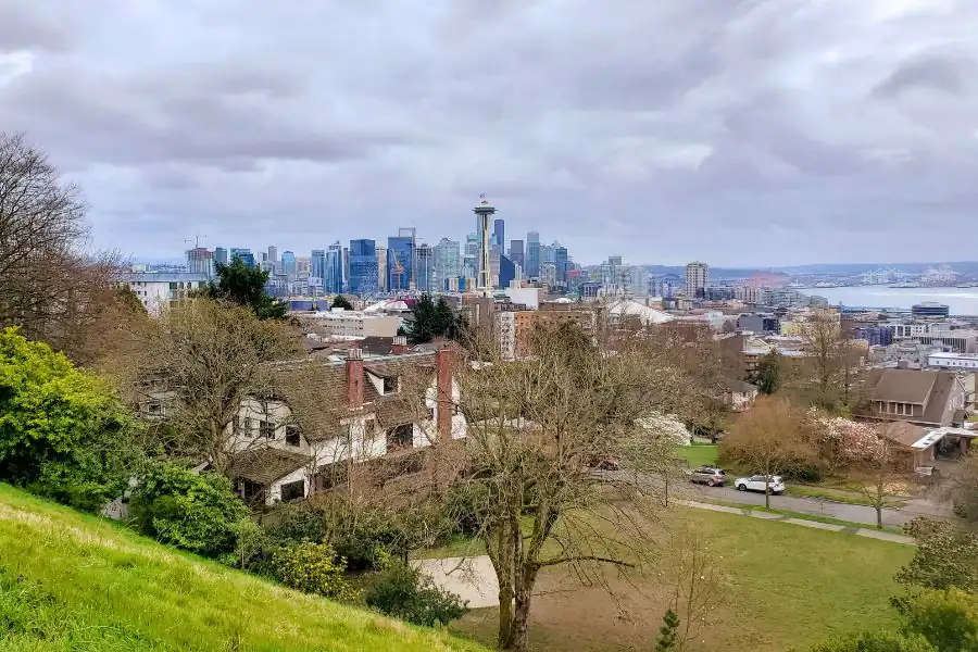 Moody Seattle skyline for a personal Pacific Northwest travel story about memory, music, and place