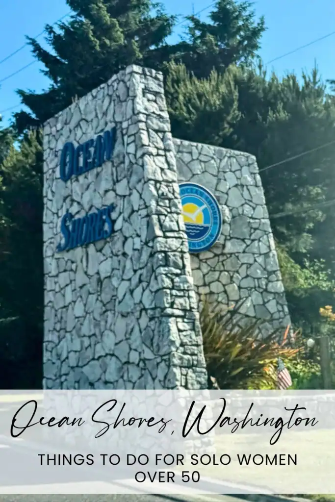 Ocean Shores sign in Washington with trees in background.gton - things to do for solo women over 50".