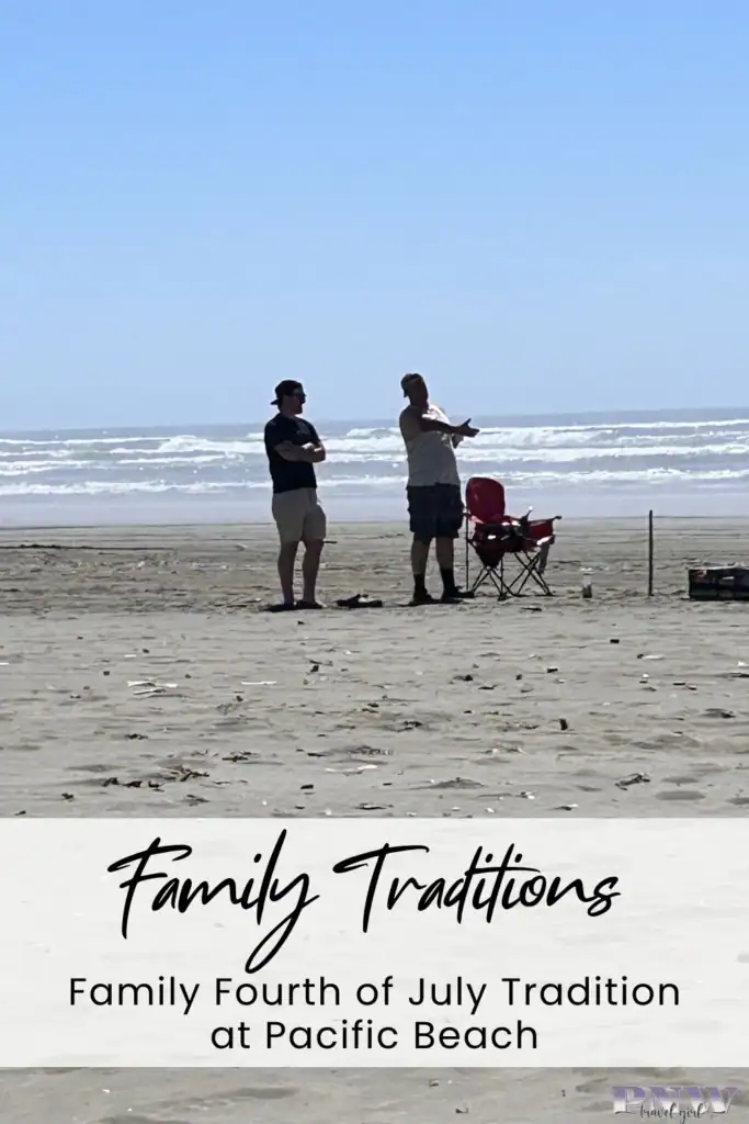 Family members standing near beach chairs during a Fourth of July gathering on the Washington coast