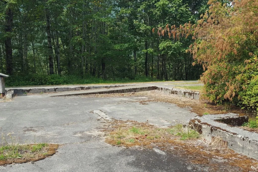 Concrete foundation remains of the historic Cedar Falls Substation along the Palouse to Cascades State Park Trail in Washington.